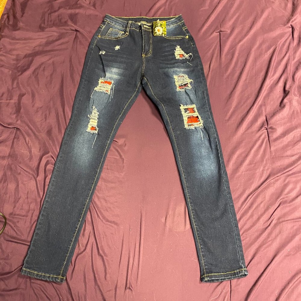 Ripped Jeans with Pattern